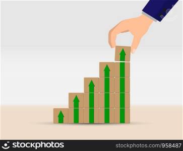 concept of career growth, business growth or financial success. Hand is a ladder of cubes with up arrows.
