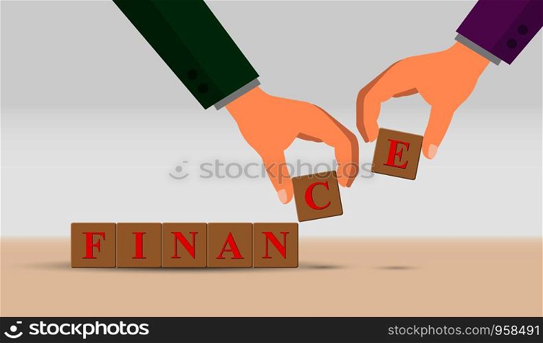 concept of financial growth or financial success, business. The hand makes the word FINANCE from cubes with letters.