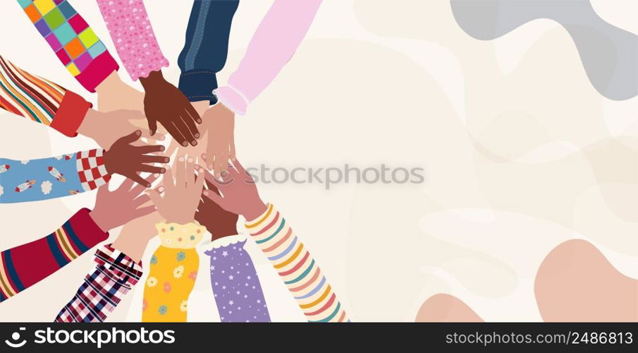 Concept of inclusion diversity equality. Group of multicultural children s arms and hands in a circle on top of each other. Children and babies from different country nations and continents