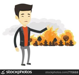 Concerned asian man pointing at forest in fire. Man standing on the background of a big forest fire. Environmental destruction concept. Vector flat design illustration isolated on white background.. Man standing on the background of wildfire.