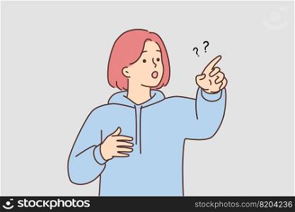 Confused girl point at something feeling shocked and stunned. Frustrated teenager show direction. Vector illustration.. Frustrated girl point with finger at something