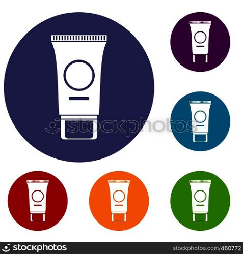 Cosmetic cream tube icons set in flat circle reb, blue and green color for web. Cosmetic cream tube icons set