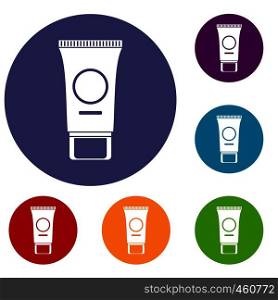 Cosmetic cream tube icons set in flat circle reb, blue and green color for web. Cosmetic cream tube icons set