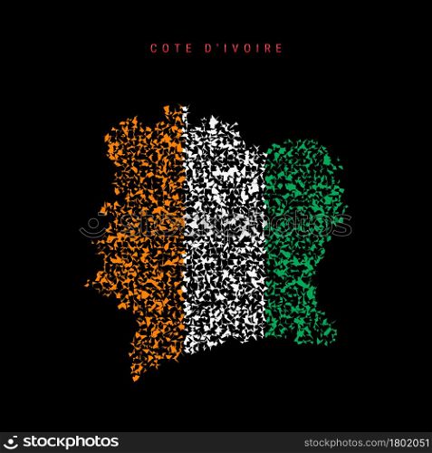 Cote d Ivoire flag map, chaotic particles pattern in the colors of the Ivory Coast flag. Vector illustration isolated on black background.. Cote d Ivoire flag map, chaotic particles pattern in the Ivory Coast flag colors. Vector illustration