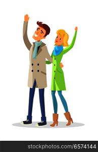 Couple in warm winter clothes looks up in the sky. Joyful young man and woman with raised hands. Adults together enjoy life and waving hello to somebody vector illustration in flat style design. Couple in Warm Winter Clothes Looks up in the Sky.