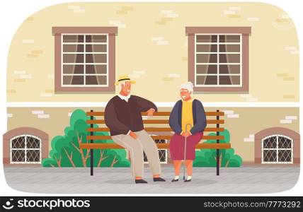 Couple of retirees spend time outdoors sitting on bench. Romance of elderly people on meeting. Characters in happy relationship talking, sitting on bench near house. Man with lady have rest together. Couple spend time outdoors sitting on bench near house. Romance of elderly people on meeting
