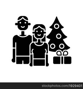 Couple spending Christmas together black glyph icon. Celebrating holidays with partner. Winter activities with family, spouse. Silhouette symbol on white space. Vector isolated illustration. Couple spending Christmas together black glyph icon