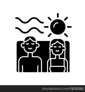 Couple spending vacation together black glyph icon. Quality time with partner. Romantic summer vacation. Couple relaxing at beach. Silhouette symbol on white space. Vector isolated illustration. Couple spending vacation together black glyph icon