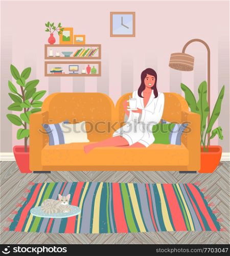 Cozy home interior of the living room. Young girl in white coat is sitting on yellow sofa with cup of tea. Decorative couch pillow. Potted plants, cat on mat. Book shelf, striped rug. Rest at home. Girl at home on the couch, in a bathrobe and with a mug of tea. Cat on the mat. Cozy house