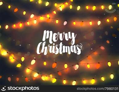 Cozy yellow Christmas lights garlands, greeting card with Merry Christmas typography