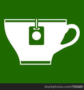Cup with teabag icon white isolated on green background. Vector illustration. Cup with teabag icon green