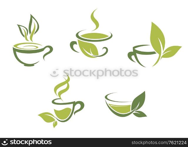 Cups of fresh tea and green leaves