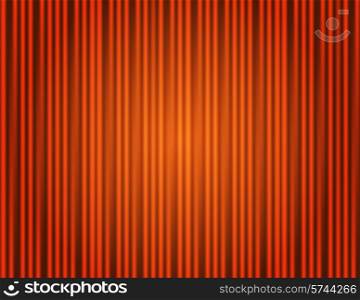 Curtain orange closed with light spots in a theater