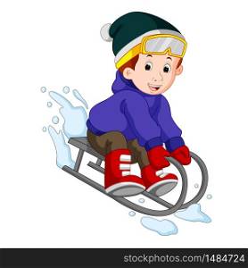 cute boy sledding in snow