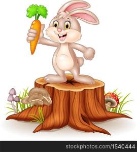 Cute bunny holding carrot on tree stump