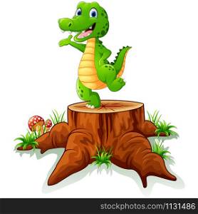 Cute crocodile posing on tree stump
