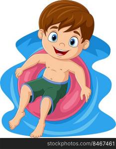 Cute little boy floating on inflatable ring