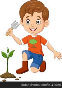 Cute little boy planting a plant