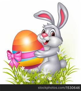 Cute little bunny holding easter eggs