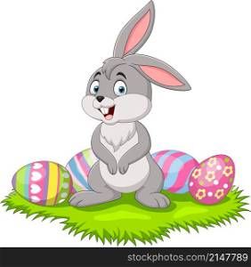 Cute little bunny with Easter egg in the grass