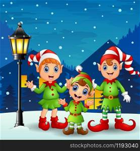 Cute little kid elves with snowfall falling at night background