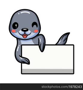 Cute little seal cartoon with blank sign