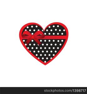 Cute polka dot black and white heart as retro fabric applique with red ribbon and bow in shabby chic style. Valentines day concept. Cute hearts with ribbon and bow in shabby chic style