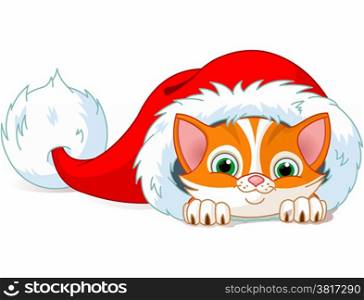 Cute red kitten sits in Santa?s Hat.