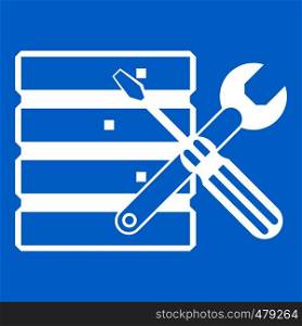 Database with screwdriverl and spanner icon white isolated on blue background vector illustration. Database with screwdriverl and spanner icon white