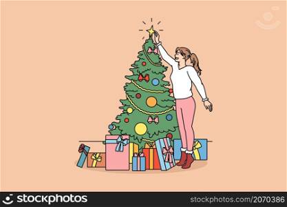 Decorating and preparing for winter holidays concept. Smiling girl standing decorating Christmas tree and collecting New year presents in colorful boxes vector illustration . Decorating and preparing for winter holidays concept
