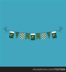 Decorations bunting flags for Pakistan national day holiday in flat design. Independence day or National day holiday concept.
