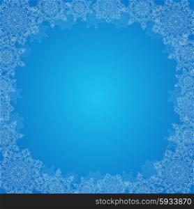 Decorative Christmas frame with snowflakes on a blue background
