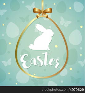 Decorative green Easter greeting card with silhouette of white rabbit in golden frame.