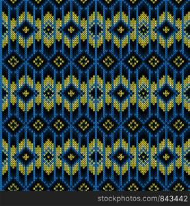 Decorative knitted seamless geometric pattern in yellow and blue hues, vector texture of fabric
