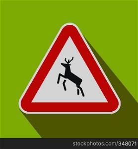 Deer traffic warning sign icon in flat style on a green background. Deer traffic warning sign icon, flat style