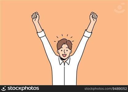 Delighted man celebrates victory by raising hands up and rejoicing in career achievements or end working day. Business man shouts with smile and is delighted with amazing news promising income growth. Delighted man celebrates victory by raising hands up and rejoicing in career achievements