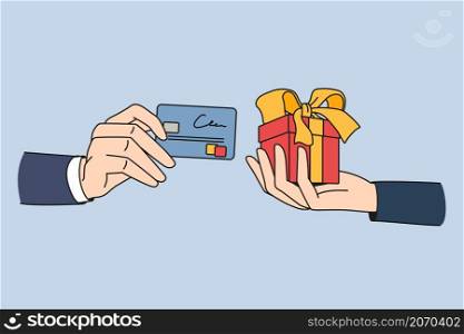 Delivery service and paying with card concept. Human hand making payment with credit card and hand of seller or deliveryman giving present holiday box vector illustration . Delivery service and paying with card concept