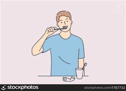 Dental hygiene and health concept. Young positive man cartoon character standing and cleaning teeth woth toothbrush and paste in bathroom vector illustration . Dental hygiene and health concept