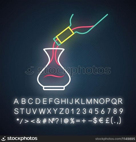 Dessert wine decantering neon light icon. Alcohol beverage pouring in decanter. Aperitif drink bottle. Barman, sommelier. Glowing sign with alphabet, numbers and symbols. Vector isolated illustration
