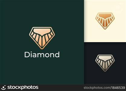 Diamond or gem logo in luxury and classy represent jewelry or crystal