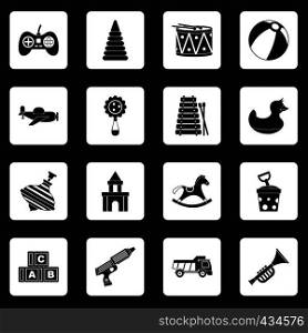 Different kids toys icons set in white squares on black background simple style vector illustration. Different kids toys icons set squares vector