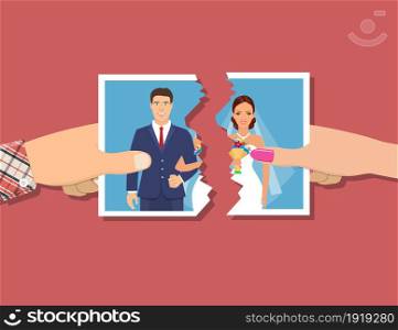 Divorcement. Man and woman hands tear apart wedding photo. Break up of relationship. End of family life. Disengagement of young former wife and husband. Divorce concept.. Break up of relationship.