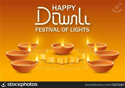 Diya oil lamp on podium and many of lamps around on yellow background with rangoli and text lettering happy Diwali festival of lights. Concept indian holiday deepavali