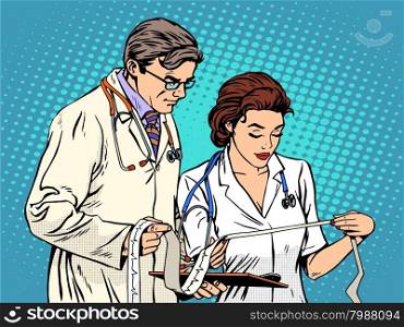 Doctor and nurse looking cardiogram pop art retro style. Medicine and health, heart disease