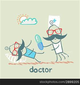 Doctor giving a pill