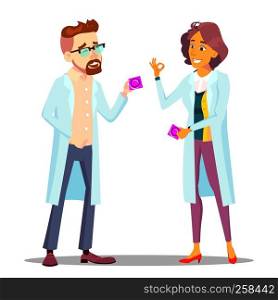 Doctor Holding Condom Packaging, Sex Education At School Vector. Isolated Illustration. Doctor Holding Condom Packaging, Sex Education At School Vector. Isolated Cartoon Illustration