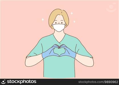 Doctors help and love, safety and care during coronavirus pandemic concept. Woman professional medic or nurse in protective face mask, gloves and green working uniform forming heart with fingers . Doctors help and love, safety and care during coronavirus pandemic concept