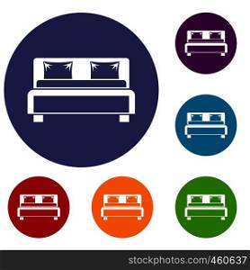 Double bed icons set in flat circle reb, blue and green color for web. Double bed icons set