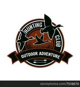 Duck hunting insignia for hunting club sporting design with retro stylized round badge with flying flock of mallard ducks, decorated by ribbon banner with text Outdoor Adventure. Duck hunting retro badge for hunters club design