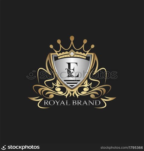 E Letter Gold Shield Logo. Elegant vector logo badge template with alphabet letter on shield frame ornate vector design.